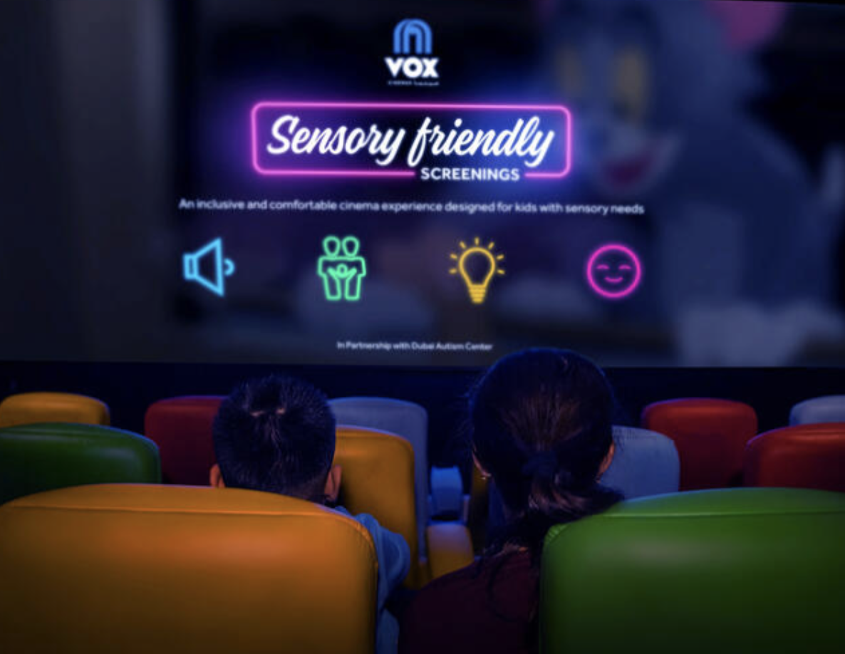 Ad showing individuals watching a Sensory Friendly showing of a Movie at Vox Cinemas